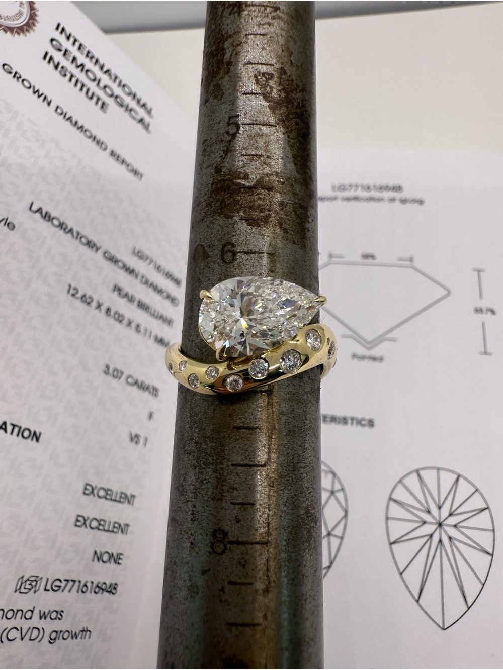 3.07 carat F VS1 pear east west with polka dot band diamond engagement ring - Picture 3 of 12